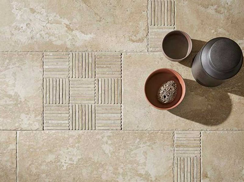 3 brown jars on matt beige floor tiles with structure that support good orientation